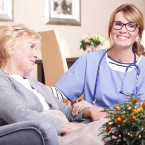 Happy nurse and patient